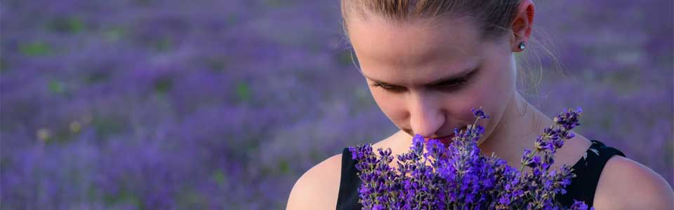 smelling flowers