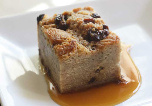 Cinnamon Raisin Bread Pudding with Caramel-Rum Sauce